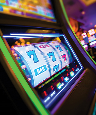 close up of slot machine showing 7