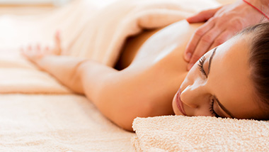A woman gets a back massage at Argosy Casino Hotel and Spa's spa in Kansas City, Missouri.
